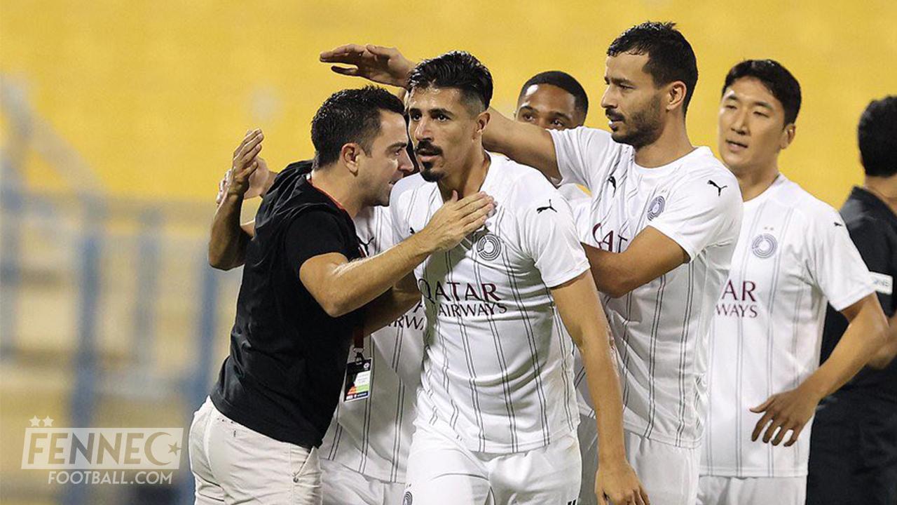 Xavi Hernandez choque Baghdad Bounedjah